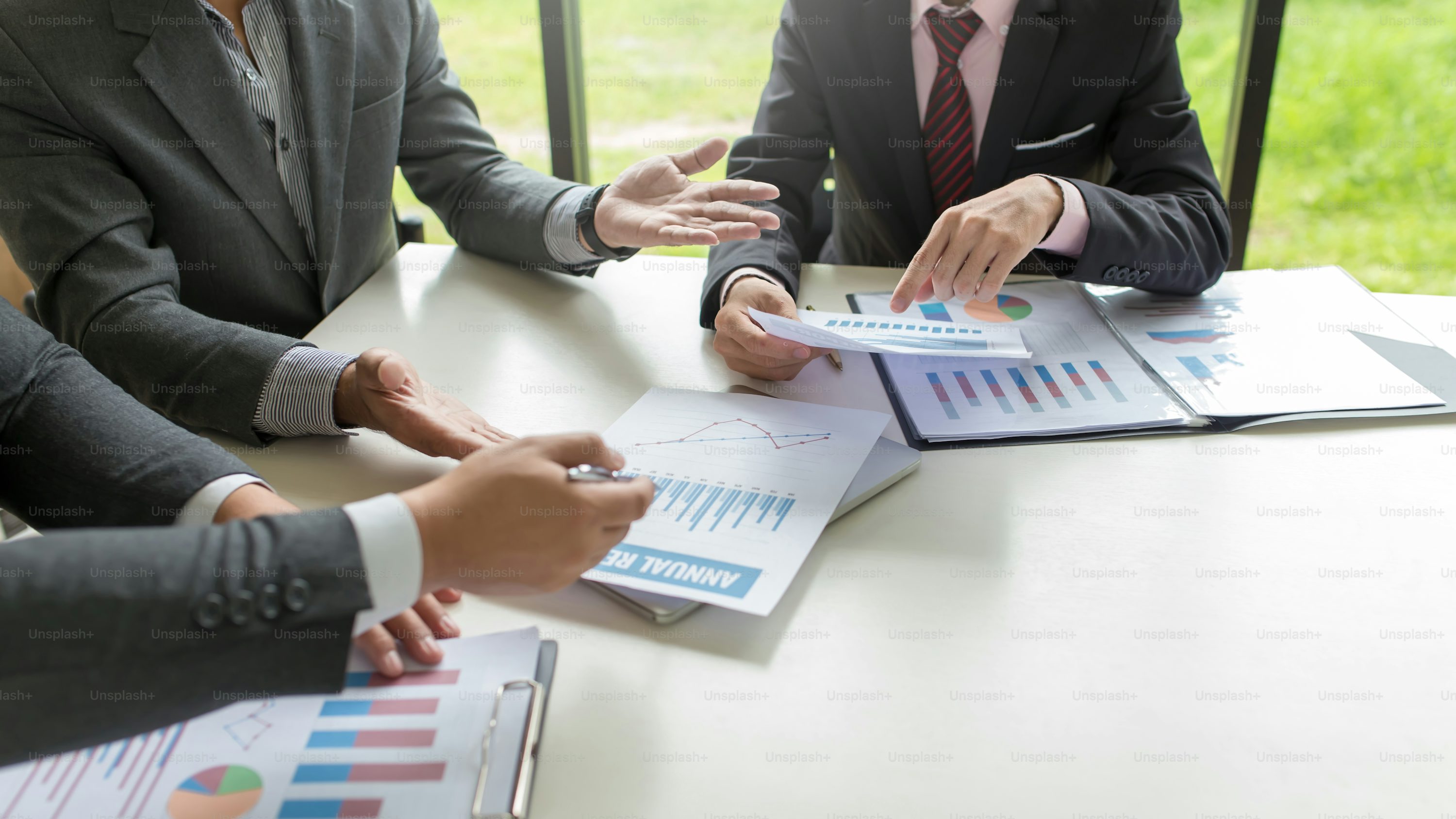 Business team reviewing demand forecasts and planning data